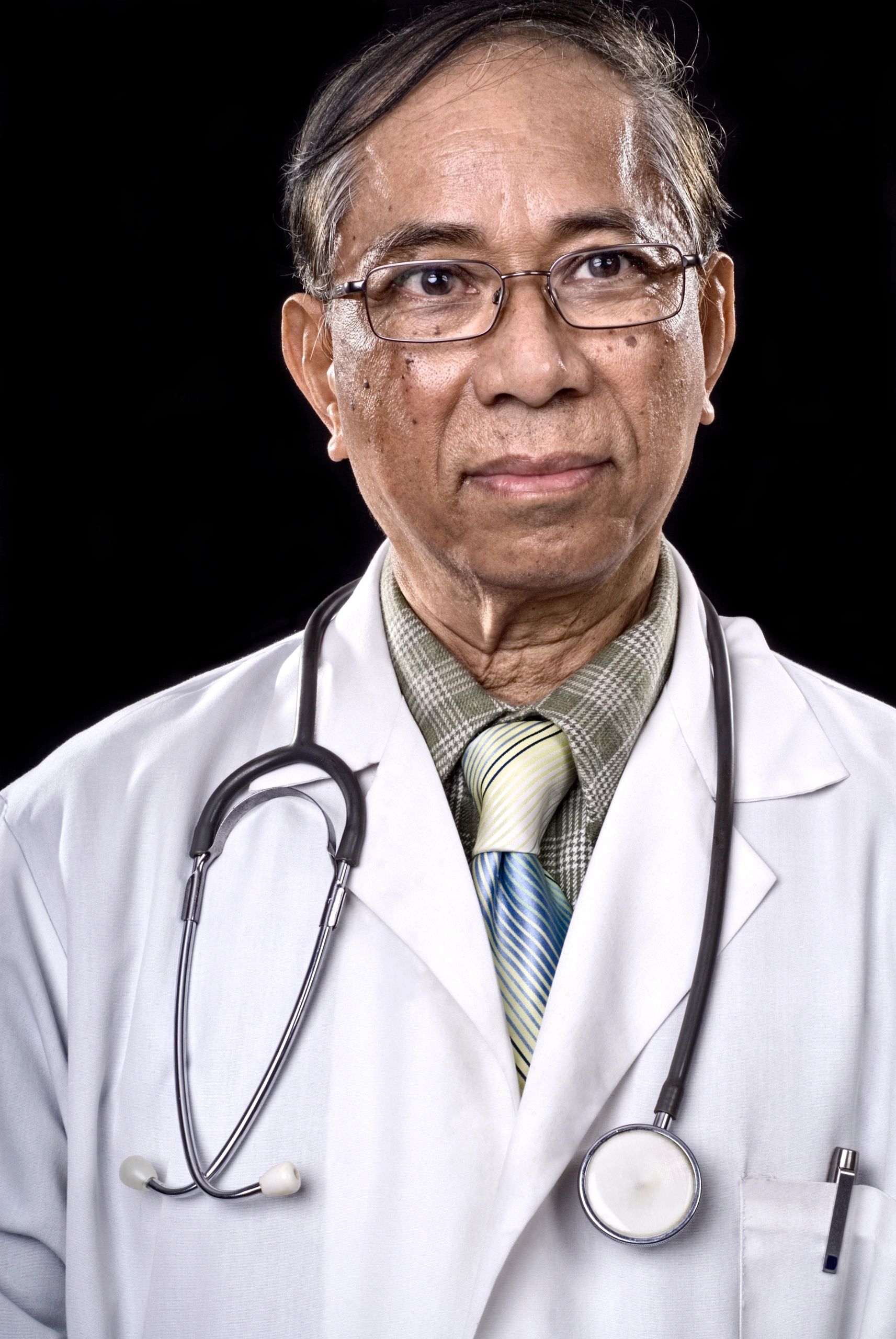 Professional physician portrait representing Dr. Dhayalan Arunkumar